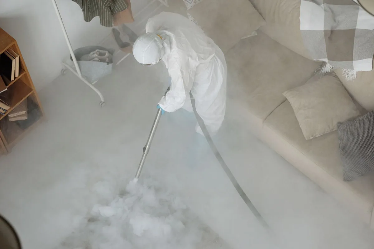 Biohazard cleanup technician in protective equipment, Suisun City, CA